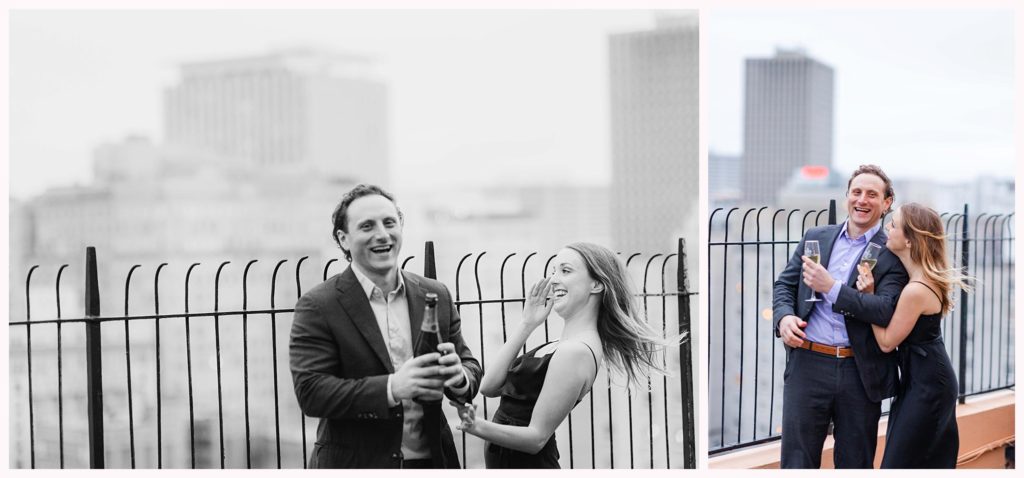 engaged couple celebrating with champagne on a rooftop