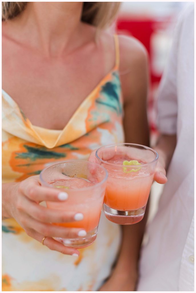 orange cocktails at sunset beach party