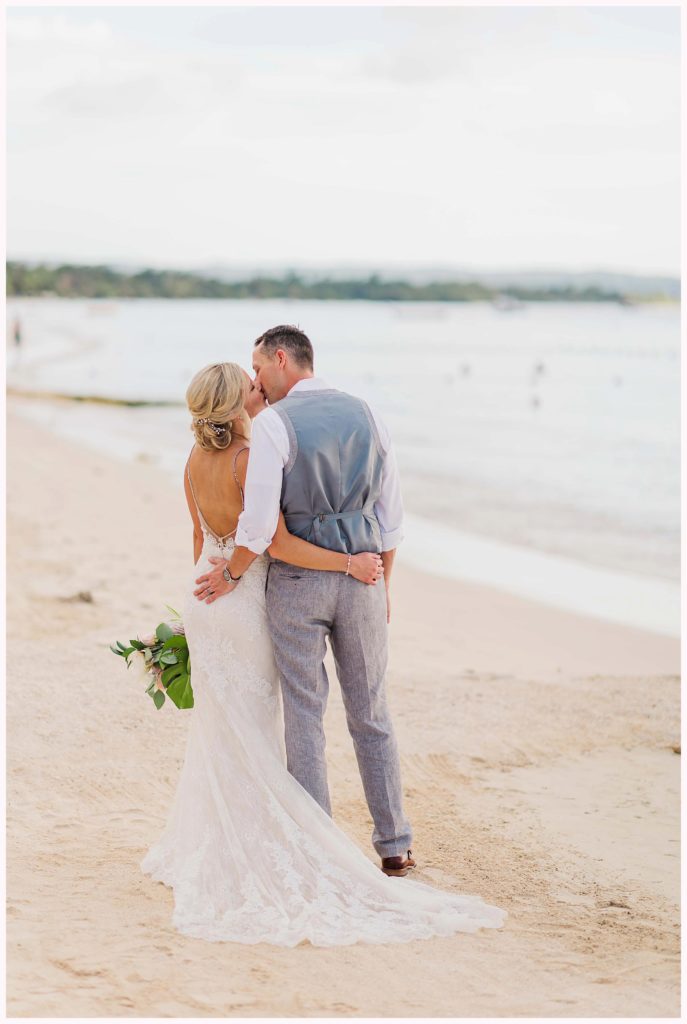 bright photo of couple on the beach during a destination wedding