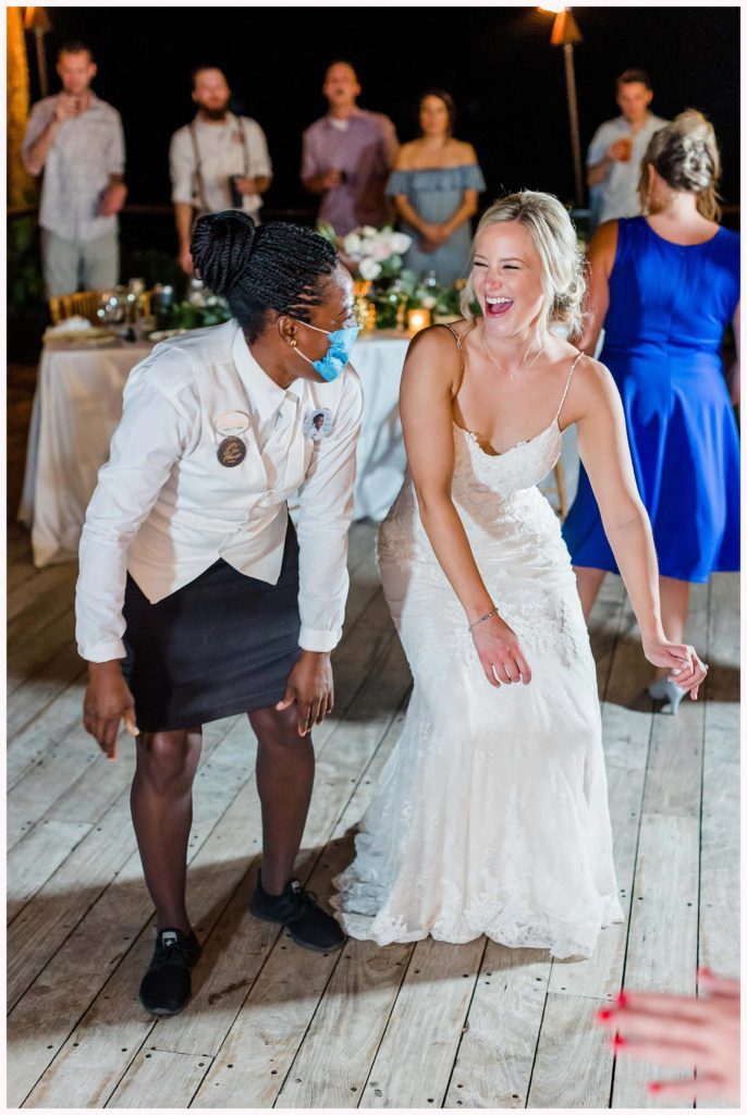 bride dances with the staff at sandals negril