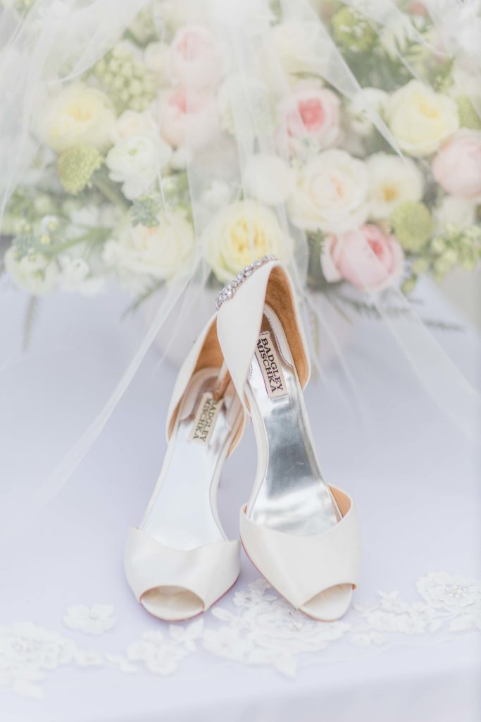 white badgley mischka shoes on wedding day