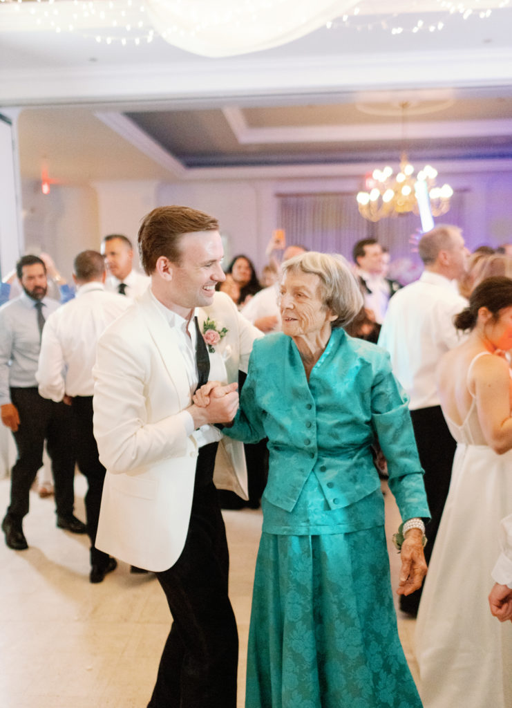 groom dances with grandma