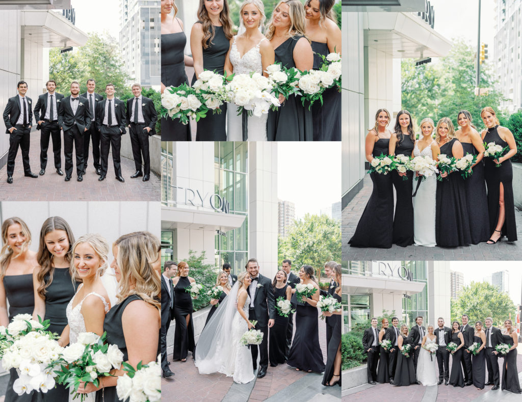 wedding party in black and white pose for photos in uptown charlotte on wedding day